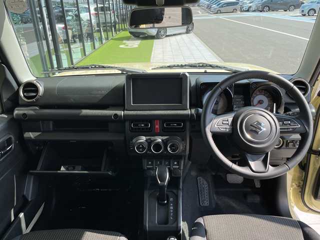 スズキ ジムニー ノマド FC 愛知県 2025(令7)年 0.1千km ベージュⅡ 登録済未使用車/スズキセーフティサポート/レーダークルーズコントロール/シートヒーター/純正アルミホイール/４ＷＤ/LEDヘッドライト/レーンキープアシスト/ダウンヒルアシストコントロール/衝突軽減システム/スマートキー/ステアリングスイッチ/プッシュスタート