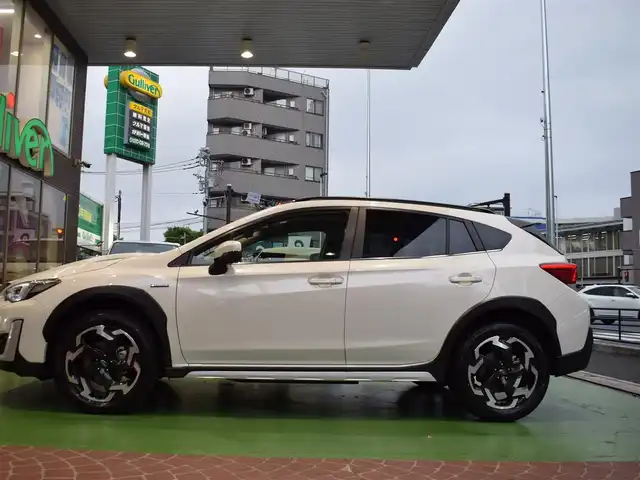 スバル ＸＶ ハイブリッド アドバンス 神奈川県 2022(令4)年 1.5万km クリスタルホワイトP ワンオーナー/純正メモリーナビ（DVD/CD/BD/BT/USB/HDMI/SD/スマホ連携）/フルセグTV/フロント・サイド・バックカメラ/アイサイト/・先行車発進お知らせ/・レーンキープアシスト＋中央維持/・レーダークルーズコントロール/・後退速度リミッター/ブランドスポットミラー/バックセンサー/前席パワーシート/パドルシフト/ステアリングスイッチ/サイドエアバック＆歩行者保護エアバック/純正フロアマット/ETC2.0/ルーフレール/スマートキー　2本/保証書/取扱説明書