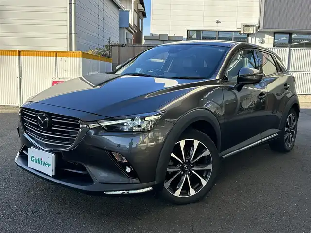 マツダ ＣＸ－３ 20SプロアクティブSパッケージ 宮城県 2018(平30)年 5.6万km マシーングレープレミアムM ・ワンオーナー/・純正ナビ/（フルセグTV/CD/DVD/Bluetooth/USB/AUX)/・クルーズコントロール/・全方位カメラ/・アイドリングストップ/・革ステアリング/・ステアリングスイッチ/・ステアリングヒーター/・MTモード/・パドルシフト/・革シート/・前席シートヒーター/・D席パワーシート/・D席メモリーシート/・電動格納ウィンカーミラー/・電動パーキングブレーキ/・ブレーキホールド/・レーンキープアシスト/・衝突軽減装置/・後方警戒システム/・前後コーナーセンサー/・BOSEスピーカー/・LEDライト/・フロントフォグランプ/・オートライト/・ISOFIX/・ETC/・フロアマット/・トノカバー/・リアプライバシーガラス/・スマートキー/・スペアキー×1/・プッシュスタート/・W＋サイドエアバッグ/ABS/・純正18インチアルミホイール/・冬タイヤあり/・横滑り防止装置/・取扱説明書