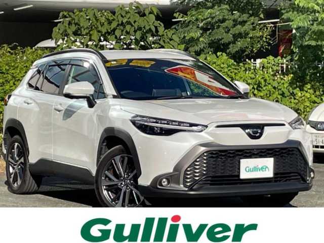 トヨタ カローラ クロス ハイブリッド Z 熊本県 2024(令6)年 3.5万km プラチナホワイトパールマイカ ワンオーナー/プッシュスタート/純正ナビ/全方位カメラ/ビルトインETC/純正18インチAW/レーダークルーズ/ハーフレザーシート/右前席パワーシート/前席シートヒーター/ステアリングヒーター/ブラインドスポットモニター/パワーバックドア/ルーフレール/LEDヘッドライト/オートライト/フォグライト/前後コーナーセンサー/横滑り防止装置/ウィンカーミラー/純正フロアマット/純正ドアバイザー/新車保証書/取扱説明書