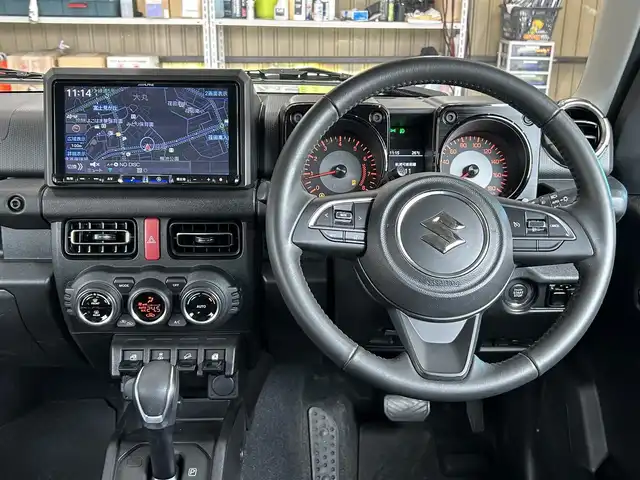 スズキ ジムニー シエラ JC 鹿児島県 2024(令6)年 0.7万km ブルーイッシュブラックパール3 ワンオーナー/アルパインBIGX9インチナビ・フルセグ・DVD・CD・SD・USB・MSV・Bluetooth（X9NXL）/AppleCarPlay・AndroidAuto対応/ナビ連動ETC2.0（ビルトイン）/バックカメラ/社外前後ドライブレコーダー（ZDR058）/SUZUKI　Safety　Support/革巻きステアリング/クルーズコントロール/ステアリングリモコン/前席シートヒーター/前席バニティミラー/IPFカーゴエクステンションforジムニー/新車時保証書/取扱説明書/スマートキー×2