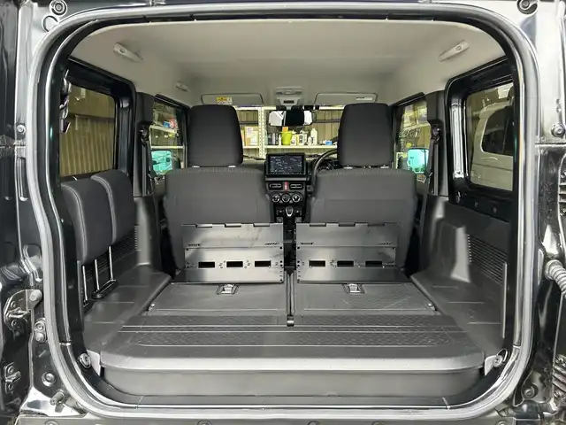 スズキ ジムニー シエラ JC 鹿児島県 2024(令6)年 0.7万km ブルーイッシュブラックパール3 ワンオーナー/アルパインBIGX9インチナビ・フルセグ・DVD・CD・SD・USB・MSV・Bluetooth（X9NXL）/AppleCarPlay・AndroidAuto対応/ナビ連動ETC2.0（ビルトイン）/バックカメラ/社外前後ドライブレコーダー（ZDR058）/SUZUKI　Safety　Support/革巻きステアリング/クルーズコントロール/ステアリングリモコン/前席シートヒーター/前席バニティミラー/IPFカーゴエクステンションforジムニー/新車時保証書/取扱説明書/スマートキー×2