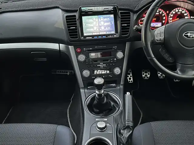 スバル レガシィ Ｂ４ 2．0GT スペックB 千葉県 2006(平18)年 9.2万km サテンホワイトパール 社外DVDナビ/(AM/FM/AUX/CD/MD)/地デジチューナー/STiエアロ（フロント・リア）/STiタワーバー/6速MT/4WD/ETC/フォグランプ/ウィンカーミラー/電動格納ミラー/純正18インチAW/シートリフター/禁煙車/フロアマット/ドアバイザー/スペアキー/取扱説明書/保証書