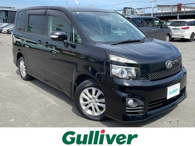 トヨタ ヴォクシー ZS 道東・釧路十勝 2012(平24)年 6.9万km ブラック 4WD/寒冷地仕様/ナビ MDV-L530W　/　(AM/FM/CD/DVD/BT)/フリップダウンモニター　/エンジンスターター/バックカメラ/片側パワースライドドア/冬タイヤ積込/純正16インチAW/純正フロアマット/ドアバイザー/MTモード付AT/オートライト/ABS/横滑り防止装置
