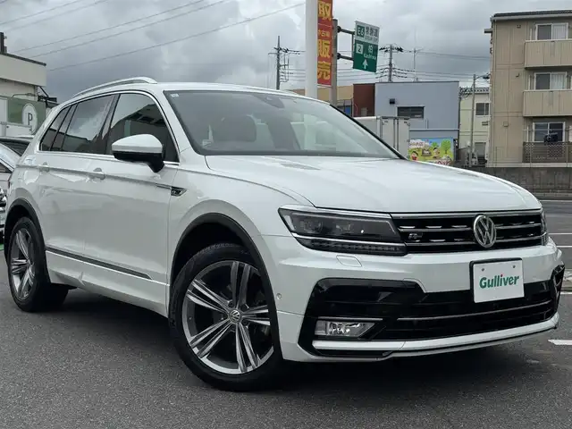 フォルクスワーゲン ティグアン TSI Rライン 千葉県 2017(平29)年 7.5万km オリックスホワイトパールエフェクト ワンオーナー車/衝突被害軽減ブレーキ/レーンキープアシスト/アダプティブクルーズコントロール/LEDヘッドライト/カーテンエアバッグ/前後コーナーセンサー/純正9.2インチメモリーナビ/Bluetooth/バック+全方位カメラ/CD＆DVD再生/ワンセグTV/ETC/前後ドライブレコーダー/ターボ車/純正19インチアルミホイール/純正フロアマット/ハーフレザーシート/革巻きステアリング/プッシュスタート/スマートキー/スペアキー/取扱説明書＆保証書