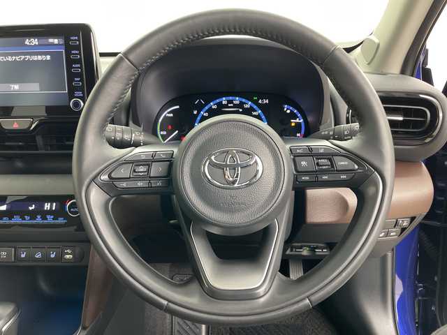 トヨタ ヤリスクロス ハイブリッド Z 道央・札幌 2021(令3)年 3万km ダークブルーマイカM ・4WD/・寒冷地仕様/・純正ディスプレイオーディオBT・AppleCarPlay・AndoroidAuto/・バックカメラ/・レーダークルーズコントロール/・衝突軽減システム/・レーンキープアシスト/・ブラインドスポットモニター/・ダウンヒルアシストコントロール/・オートハイビーム/・AC100V電源/・ビルトインETC/・LEDヘッドライト/・ステアリングヒーター/・前席シートヒーター/・運転席パワーシート/・ハーフレザーシート/・アイドリングストップ/・純正フロアマット/・取扱説明書/・保証書/・スマートキー/・スペアキー