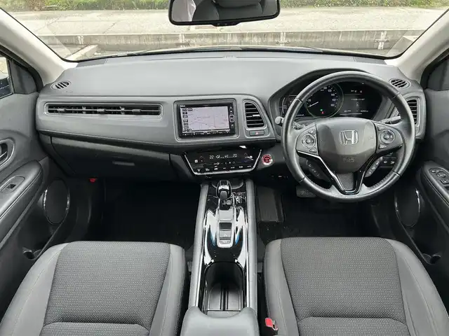 ホンダ ヴェゼル ハイブリッド X ホンダセンシング 富山県 2020(令2)年 6.5万km ミッドナイトブルービームM ４WD/フルセグTV/純正ナビ/Bluetooth/ドライブレコーダー/DVD再生/バックカメラ/ビルトインETC/レーダークルーズコントロール/レーンキープアシスト/横滑り防止装置/衝突軽減装置/社外アルミホイール/純正AWサマータイヤ4本車載/ドアバイザー/オートライト/フォグランプ