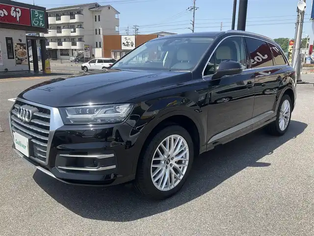 アウディ Ｑ７ 2．0TFSIクワトロ 滋賀県 2017(平29)年 5万km ディープブラックパールエフェクト 車検8年7月まで/フルタイム4WD/アウディプレセンス/クルーズコントロール/ホールドアシスト/パーキングシステム/ベージュ本革シート/純正ナビ/Bluetooth、DVD、CD、フルセグテレビ/全方位モニター、バックカメラ/ETC2.0/前席パワーシート/フロント、リアシートヒーター/パワーバックドア/コムテック360°ドライブレコーダー/社外デジタルインナーミラー/純正20インチアルミホイール/スペアキー有り/取扱説明書、保証書