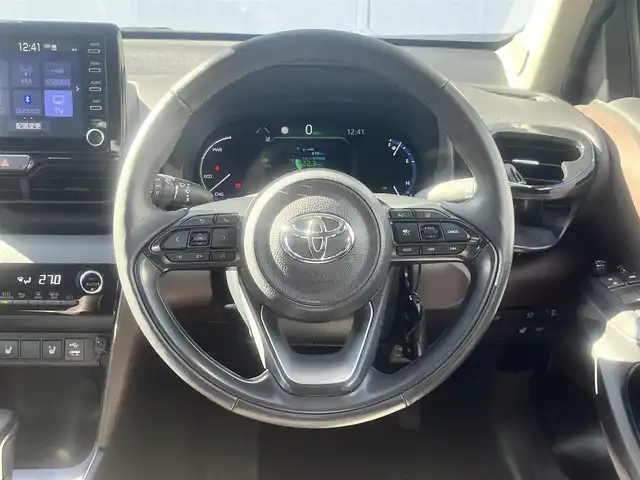 トヨタ ヤリスクロス ハイブリッド Z 島根県 2021(令3)年 2.6万km ブラックマイカ 純正ディスプレイオーディオ　/フルセグＴＶ /Bluetoothオーディオ/全方位/フロント/サイド/バックカメラ/ビルトインETC /前方ドライブレコーダー/レーダークルーズコントロール/オートハイビーム　/パワーバックドア　/ハーフレザーシート/前席シートヒーター　/運転席パワーシート/電子パーキングブレーキ/衝突軽減ブレーキ/レーンアシスト/前後コーナーセンサー/純正LEDヘッドライト/純正フロアマット/保証書・取説・スペアキー1本