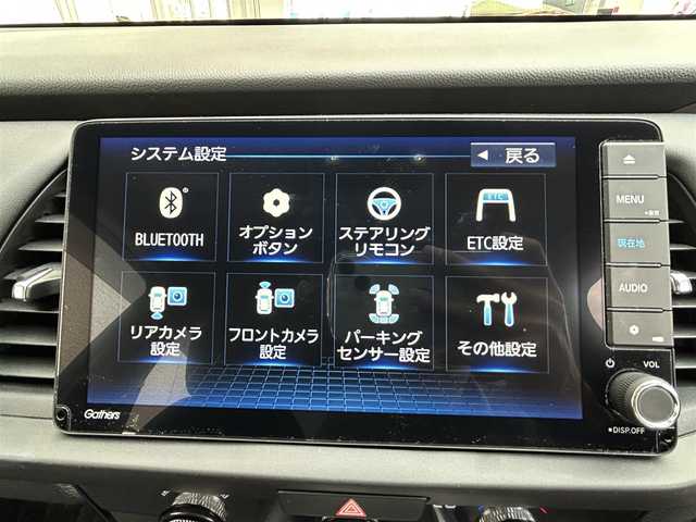 ホンダ フィット e:HEVクロスター 大阪府 2023(令5)年 0.6万km フィヨルドミストパール ワンオーナー/純正8インチナビ(BT/CD)/レーダークルーズコントロール/フロントカメラ/バックモニター/レーンキープアシスト/衝突被害軽減システム/横滑り防止装置/前後コーナーセンサー/ハーフレザーシート/純正フロアマット/純正１６インチAW/ルーフレール/ETC/取扱説明書/保証書/スペアキー　あり