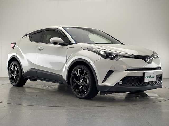 トヨタ Ｃ－ＨＲ G モード ネロ 宮崎県 2019(平31)年 2.8万km ホワイトパールクリスタルシャイン 〇禁煙車/〇純正ナビ【NSZT-Y68T】/〇BT/フルセグTV/CD/DVD/〇バックカメラ/〇Toyota Safety Sense P/〇ACC/〇純正ブラック18インチAW/〇シートヒーター(D/N)/〇ブラインドスポットモニター/〇前後ドライブレコーダー/〇LEDヘッドライト/〇オートライト/〇オートハイビーム/〇プッシュスタート/〇スマートキー×2/〇電格ミラー/〇ステアリングスイッチ/〇前後コーナーセンサー/〇オートホールド