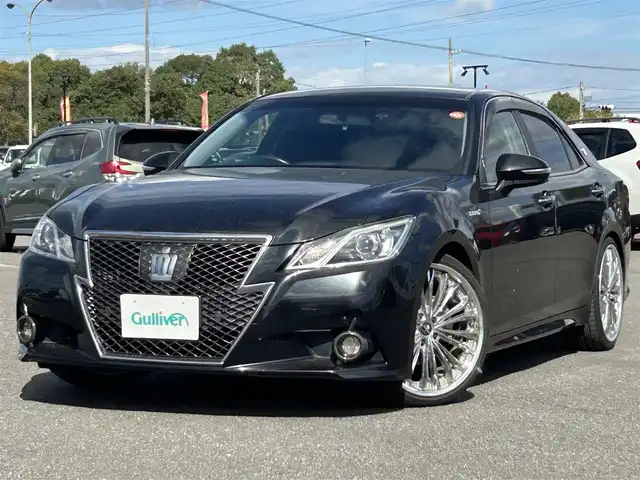 トヨタ クラウン ハイブリッド アスリートS 道央・札幌 2013(平25)年 11.1万km プレシャスブラックパール ４WD/寒冷地仕様/純正メーカーナビ/CD/DVD/BT/フルセグ/社外20アルミ/横滑り防止装置/レーダークルーズコントロール/クリアランスソナー/バックカメラ/ビルトインETC/ドライブレコーダー/EVMODE/ワイパーデアイサー/前席パワーシート/前席シートヒーター/ハンドルヒーター/ステアリングリモコン/MTモード付AT/プッシュスタート/スマートキー/HIDヘッドライト/オートライト/フォグランプ/電動格納ミラー/ヒーテッドドアミラー/ウィンカーミラー/純正フロアマット/ドアバイザー