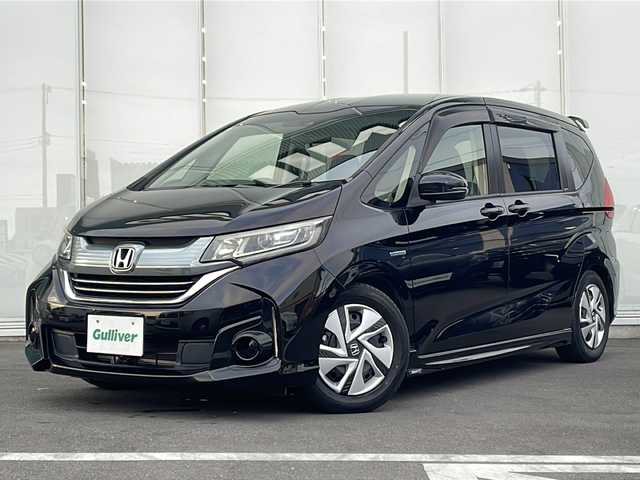 ホンダ フリード ハイブリット G ホンダセンシング 神奈川県 2016(平28)年 4.1万km クリスタルブラックパール Ｍｏｄｕｌｏエアロ　/純正SDナビ　/CD/DVD/AppleCarPlay/Bluetooth/バックカメラ　/ビルドインＥＴＣ　/両側パワースライドドア　/レーダークルーズコントロール/急速充電ポート　/ＡＢＳ　/横滑り防止装置　/レーンキープアシスト　/コーナーセンサー　/スマートキー　/プッシュスタート/Wエアバッグ/衝突被害/オートライト　/キセノンヘッドライト/ドアバイザー