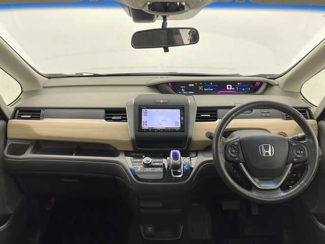 ホンダ フリード ハイブリット G ホンダセンシング 長野県 2016(平28)年 4.1万km クリスタルブラックパール ホンダセンシング/純正SDナビ /フルセグテレビ/Bluetooth/AppleCarPlay/DVD/バックカメラ　/ビルドインＥＴＣ　/両側パワースライドドア　/レーダークルーズコントロール/レーンキープアシスト　/コーナーセンサー　/オートライト/キセノンヘッドライト/ドアバイザー/ローダウン（純正サス有）