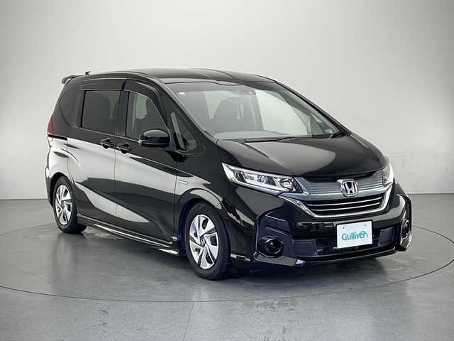 ホンダ フリード ハイブリット G ホンダセンシング 長野県 2016(平28)年 4.1万km クリスタルブラックパール ホンダセンシング/純正SDナビ /フルセグテレビ/Bluetooth/AppleCarPlay/DVD/バックカメラ　/ビルドインＥＴＣ　/両側パワースライドドア　/レーダークルーズコントロール/レーンキープアシスト　/コーナーセンサー　/オートライト/キセノンヘッドライト/ドアバイザー/ローダウン（純正サス有）