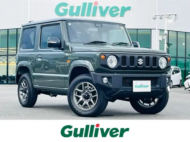 スズキ ジムニー XC 佐賀県 2025(令7)年 0.1万km ジャングルグリーン 登録時走行距離167ｋｍ/セーフティサポート/　・デュアルセンサーブレーキサポート/　・誤発信抑制機能/　・車線逸脱警報機能/　・ふらつき警報機能/　・先行車発進お知らせ機能/　・標識認識機能/　・ハイビームアシスト/ETC/フロアマット/アイドリングストップ/クルーズコントロール/LEDヘッドランプ/オートライト/ヘッドランプウォッシャー/フロントフォグランプ/純正アルミホイール/プライバシーガラス/革巻きステアリングホイール/ステアリングスイッチ/SRSエアバッグ（運転席/助手席/サイド/カーテン）/オートエアコン/スマートキー/プッシュスタート