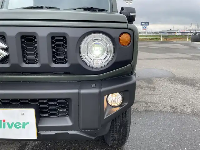 スズキ ジムニー XC 佐賀県 2025(令7)年 0.1万km ジャングルグリーン 登録時走行距離167ｋｍ/セーフティサポート/　・デュアルセンサーブレーキサポート/　・誤発信抑制機能/　・車線逸脱警報機能/　・ふらつき警報機能/　・先行車発進お知らせ機能/　・標識認識機能/　・ハイビームアシスト/ETC/フロアマット/アイドリングストップ/クルーズコントロール/LEDヘッドランプ/オートライト/ヘッドランプウォッシャー/フロントフォグランプ/純正アルミホイール/プライバシーガラス/革巻きステアリングホイール/ステアリングスイッチ/SRSエアバッグ（運転席/助手席/サイド/カーテン）/オートエアコン/スマートキー/プッシュスタート