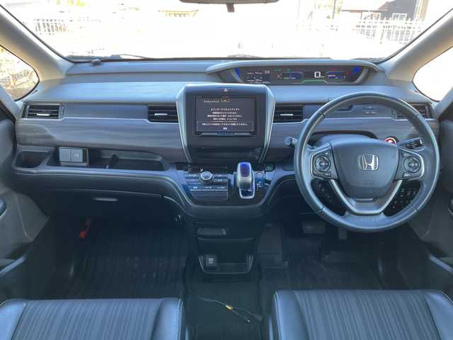 ホンダ フリード ハイブリット G ホンダセンシング 山梨県 2019(平31)年 5.8万km プレミアムスパークルブラックパール 社外カロッツェリアナビ　/フルセグ　/バックカメラ　/ETC　/両側パワースライドドア　/純正15インチアルミホイール　/ハーフレザーシート　/革巻きステアリング　/クルーズコントロール　/LEDライト