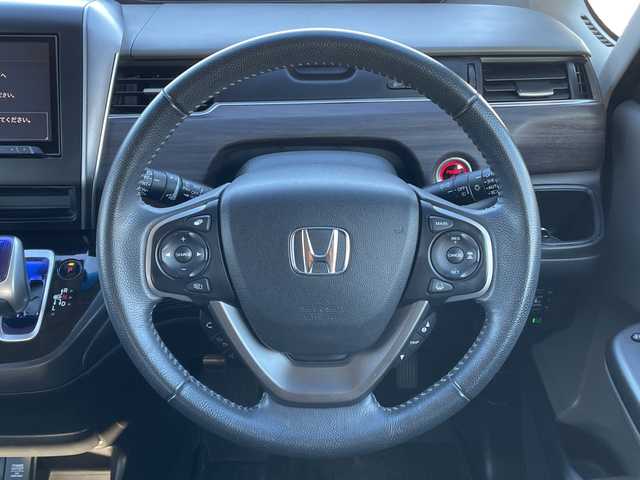 ホンダ フリード ハイブリット G ホンダセンシング 山梨県 2019(平31)年 5.8万km プレミアムスパークルブラックパール 社外カロッツェリアナビ　/フルセグ　/バックカメラ　/ETC　/両側パワースライドドア　/純正15インチアルミホイール　/ハーフレザーシート　/革巻きステアリング　/クルーズコントロール　/LEDライト