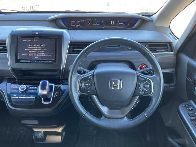 ホンダ フリード ハイブリット G ホンダセンシング 山梨県 2019(平31)年 5.8万km プレミアムスパークルブラックパール 社外カロッツェリアナビ　/フルセグ　/バックカメラ　/ETC　/両側パワースライドドア　/純正15インチアルミホイール　/ハーフレザーシート　/革巻きステアリング　/クルーズコントロール　/LEDライト