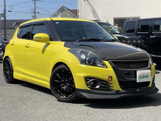 スズキ スイフト スポーツ 和歌山県 2014(平26)年 6.4万km チャンピオンイエロー 社外ナビ/（AM/FM/フルセグTV/USB/DVD/Bluetooth/SD/HDMI）/6MT/3連メーター/社外レーダー/TEIN FDFC車高調/カーボンボンネット/カーボングリル/カーボンリアウィング/フルエアロ/Greddyフロントリップスポイラー/mseマフラー/ADVANRacing　RSII17インチホイール/momoハンドル/スマホ連動ドライブレコーダー/フォグランプ/プッシュスタート/純正マット/取扱説明書/保証書/純正　フロントグリル/ハンドル有
