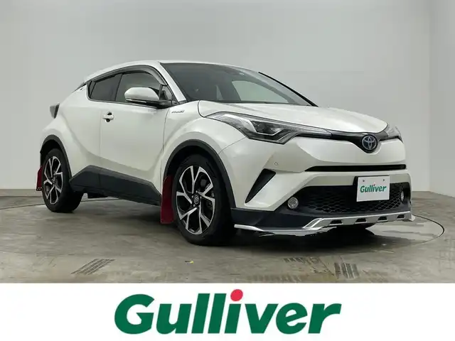 トヨタ Ｃ－ＨＲ G 岡山県 2017(平29)年 5.4万km ホワイトパールクリスタルシャイン 純正SDナビ/型番：NSZT-W66T/　・バックカメラ/　・FM/AM/Bluetooth/フルセグ/CD/DVD/ハーフレザーシート/・前席シートヒーター/トヨタセーフティーセンス/・プリクラッシュセーフティ/・レーンディパーチャーアラート/・オートマチックハイビーム/・レーダークルーズコントロール/・コーナーセンサー/ブラインドスポットモニター/エアロ（フロント）/ETC/オートブレーキホールド/TVキャンセラー/LEDヘッドライト/純正18インチアルミ/ドアバイザー