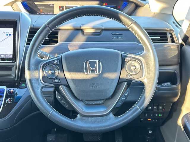 ホンダ フリード ハイブリット G ホンダセンシング 山梨県 2019(令1)年 6.2万km プレミアムスパークルブラックパール 純正ナビ　/４ＷＤ　/両側パワースライドドア　/フルセグ　/クルーズコントロール　/バックカメラ　/前方ドライブレコーダー　/ハーフレザーシート　/前席両側シートヒーター　/アクティブコーナリングライト