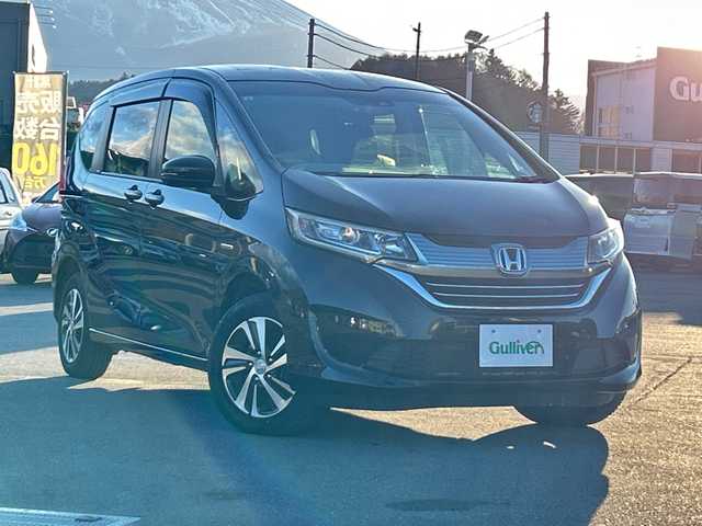 ホンダ フリード ハイブリット G ホンダセンシング 山梨県 2019(令1)年 6.2万km プレミアムスパークルブラックパール 純正ナビ　/４ＷＤ　/両側パワースライドドア　/フルセグ　/クルーズコントロール　/バックカメラ　/前方ドライブレコーダー　/ハーフレザーシート　/前席両側シートヒーター　/アクティブコーナリングライト