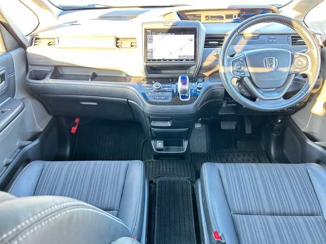 ホンダ フリード ハイブリット G ホンダセンシング 山梨県 2019(令1)年 6.2万km プレミアムスパークルブラックパール 純正ナビ　/４ＷＤ　/両側パワースライドドア　/フルセグ　/クルーズコントロール　/バックカメラ　/前方ドライブレコーダー　/ハーフレザーシート　/前席両側シートヒーター　/アクティブコーナリングライト