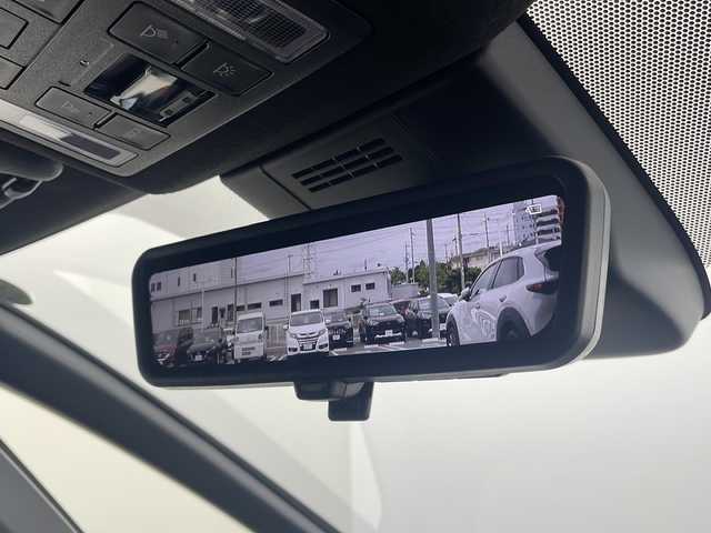 トヨタ ヴォクシー ハイブリッド S－Z 栃木県 2024(令6)年 0.9万km アティチュードブラックマイカ ワンオーナー/10.5型ディスプレイオーディオプラス〈MOP〉/・コネティッドナビ／DDV／地デジTV/・HDMI／Bluetooth／Miracast/TOYOTA SAFETY SENSE/・プリクラッシュセーフティ/・レーントレーシングアシスト/・レーンディパーチャーアラート/・レーダークルーズコントロール/・オートマチックハイビーム/・ロード－サインアシスト/・先行車発進告知/快適利便パッケージ High〈MOP〉/・両側パワースライドドア/・パワーバックドア/・2列目シートヒーター＆オットマン/・ナノイーX/・ステアリングヒーター/ドライビングサポートパッケージ〈MOP〉/・デジタルインナーミラー/・ヘッドアップディスプレイ/プロジェクター式LEDヘッドライト〈MOP〉/・アダプティブハイビームシステム/合皮＆ファブリックコンビシート/前席＆2列目シートヒーター/ビルトインETC2.0/後席/荷室アクセサリーコンセント/スマートキー＆プッシュスタート/純正17インチAW