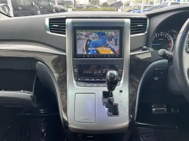 トヨタ ヴェルファイア 2．4Z Gエディション 長崎県 2013(平25)年 9.6万km パール 純正メモリナビ/CD/DVD/BT/フルセグTV/バックカメラ/純正フリップダウンモニター/両側パワースライドドア/クルーズコントロール/革調シートカバー/前席パワーシート/D席メモリーシート/モデリスタエアロ/パワーバックドア/ドライブレコーダー前後/社外レーダー/室内灯LEDヘッドライト/LEDヘッドライト/純正AW積み込み