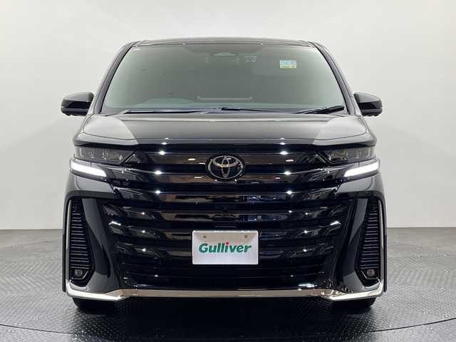 トヨタ ヴェルファイア ハイブリット Z プレミア 愛媛県 2024(令6)年 0.7万km スパークリングブラックパールクリスタルシャイン トヨタセーフティーセンス/左右独立ムーンルーフ/14インチディスプレイオーディオ/フルセグTV　AppleCarPlay AndroidAuto/Bluetooth/シートヒーター/全周囲カメラ/アダプティブクルーズコントロール/ブラインドスポットモニター/デジタルインナーミラー/パワーバックドア/エグゼクティブパワーシート（プレミアムナッパ本革シート表皮）/パワーオットマン/大型アームレスト（カップホルダー各席1個）/折り畳み式サイドテーブル/快適温熱シート