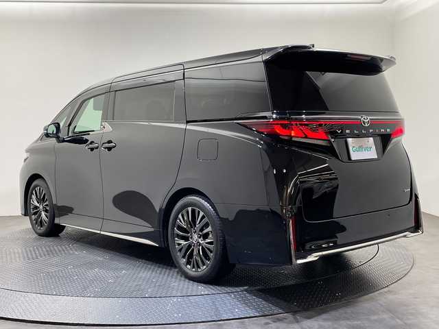 トヨタ ヴェルファイア ハイブリット Z プレミア 愛媛県 2024(令6)年 0.7万km スパークリングブラックパールクリスタルシャイン トヨタセーフティーセンス/左右独立ムーンルーフ/14インチディスプレイオーディオ/フルセグTV　AppleCarPlay AndroidAuto/Bluetooth/シートヒーター/全周囲カメラ/アダプティブクルーズコントロール/ブラインドスポットモニター/デジタルインナーミラー/パワーバックドア/エグゼクティブパワーシート（プレミアムナッパ本革シート表皮）/パワーオットマン/大型アームレスト（カップホルダー各席1個）/折り畳み式サイドテーブル/快適温熱シート