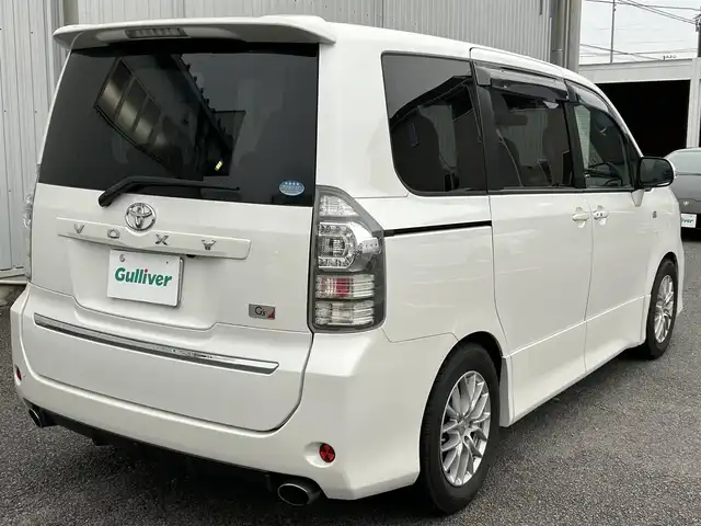 トヨタ ヴォクシー ZS G’s 静岡県 2010(平22)年 9.2万km 白 純性SDナビ（NHZN-W60G 76045）/ 【CD/DVD/BT/地デジTV】/純性LEDヘッドライト/社外16インチAW/G`sフロアマット/G`sエアロパーツ/ウォークスルー/バックカメラ/ETC/スマートキー/3列シート/Bluetooth接続/両側パワースライドドア/フルフラットシート/7人乗り/エンジンスタートボタン