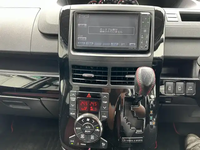 トヨタ ヴォクシー ZS G’s 静岡県 2010(平22)年 9.2万km 白 純性SDナビ（NHZN-W60G 76045）/ 【CD/DVD/BT/地デジTV】/純性LEDヘッドライト/社外16インチAW/G`sフロアマット/G`sエアロパーツ/ウォークスルー/バックカメラ/ETC/スマートキー/3列シート/Bluetooth接続/両側パワースライドドア/フルフラットシート/7人乗り/エンジンスタートボタン