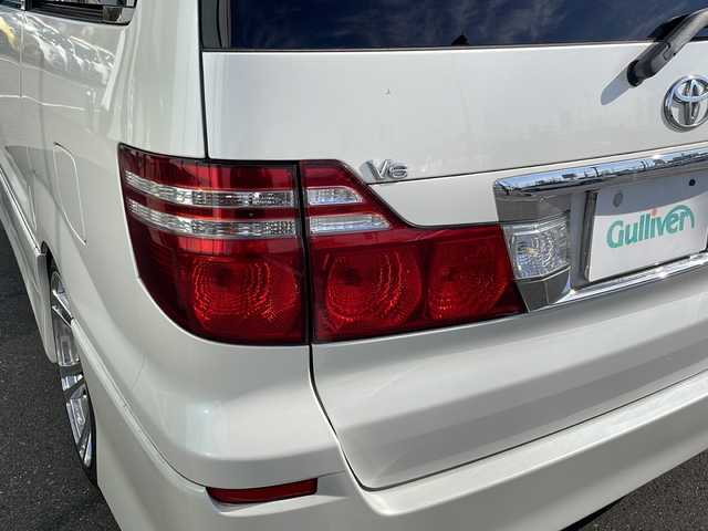トヨタ アルファード Ｇ MS LTD 茨城県 2005(平17)年 14万km ホワイトパールマイカ 社外SDナビ(Bluetooth/バックカメラ/フルセグTV/CD/DVD)/サンルーフ/盗難防止装置/冷房WAC/スペアキー/3列シート/純正フロアマット/両側パワースライドドア/ETC