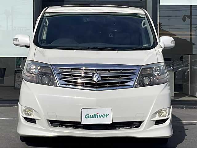 トヨタ アルファード Ｇ MS LTD 茨城県 2005(平17)年 14万km ホワイトパールマイカ 社外SDナビ(Bluetooth/バックカメラ/フルセグTV/CD/DVD)/サンルーフ/盗難防止装置/冷房WAC/スペアキー/3列シート/純正フロアマット/両側パワースライドドア/ETC