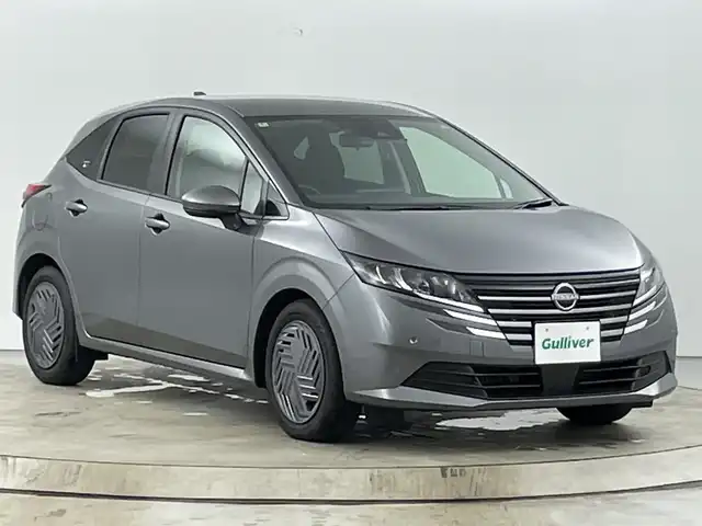 日産 ノート X 愛知県 2024(令6)年 0.3万km ダークメタルグレー 禁煙車/純正9インチナビ/（AM/FM/Bluetooth/フルセグTV)/バックカメラ/エマージェンシーブレーキ/車線逸脱警報システム/クリアランスソナー/ETC/前後ドライブレコーダー/スマートキー/スペアキー有/電子パーキング/プッシュスタート/フロアマット/横滑り防止装置/LEDヘッドライト