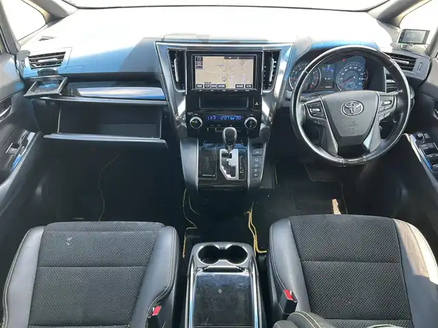 トヨタ ヴェルファイア 2.5Z Aエディデョン ゴールデンアイズ 新潟県 2017(平29)年 5.7万km ホワイトパールクリスタルシャイン 純正ナビ【フルセグTV/BT/FM・AM】/アイドリングストップ/バックカメラ/クルーズコントロール追従有/衝突軽減/フリップダウンモニター/両側パワースライドドア/電動リアゲート/前後コーナーセンサー/オートライト/ハーフレザーシート/ETC/前後ドライブレコーダー/純正フロアマット/100V充電