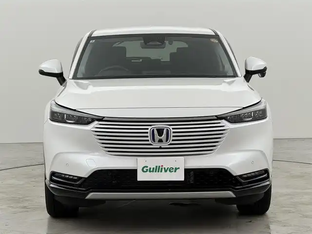 ホンダ ヴェゼル ハイブリッド e:HEV Z 福岡県 2022(令4)年 1.7万km プラチナホワイトパール 純正ナビ　/全方位カメラ　/置くだけ充電　/ビルトインETC２．０　/前後ドライブレコーダー　/アダプティブクルコン　/コーナーセンサー　/衝突被害軽減　/レーンキープ　/ＢＳＭ　/アクセル踏み間違い防止　/パワーバックドア　/シートヒーター　/ステアリングヒーター　/ＬＥＤヘッドライト