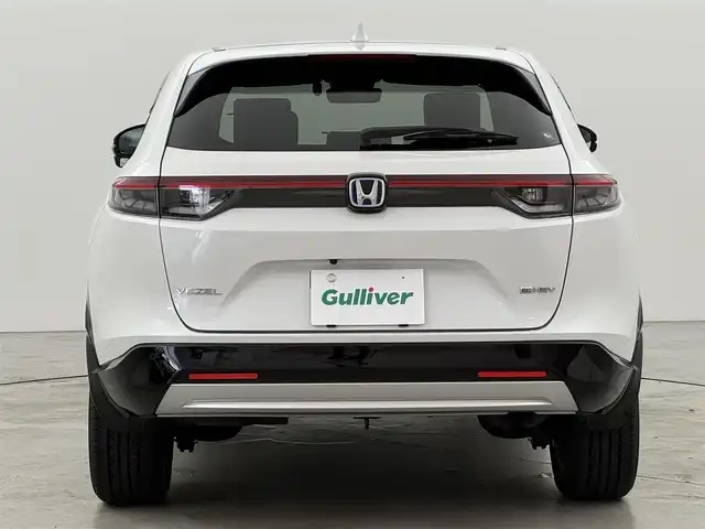 ホンダ ヴェゼル ハイブリッド e:HEV Z 福岡県 2022(令4)年 1.7万km プラチナホワイトパール 純正ナビ　/全方位カメラ　/置くだけ充電　/ビルトインETC２．０　/前後ドライブレコーダー　/アダプティブクルコン　/コーナーセンサー　/衝突被害軽減　/レーンキープ　/ＢＳＭ　/アクセル踏み間違い防止　/パワーバックドア　/シートヒーター　/ステアリングヒーター　/ＬＥＤヘッドライト