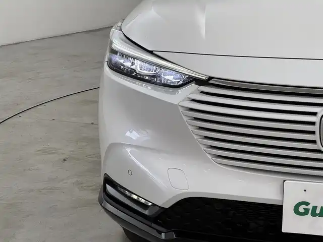 ホンダ ヴェゼル ハイブリッド e:HEV Z 福岡県 2022(令4)年 1.7万km プラチナホワイトパール 純正ナビ　/全方位カメラ　/置くだけ充電　/ビルトインETC２．０　/前後ドライブレコーダー　/アダプティブクルコン　/コーナーセンサー　/衝突被害軽減　/レーンキープ　/ＢＳＭ　/アクセル踏み間違い防止　/パワーバックドア　/シートヒーター　/ステアリングヒーター　/ＬＥＤヘッドライト
