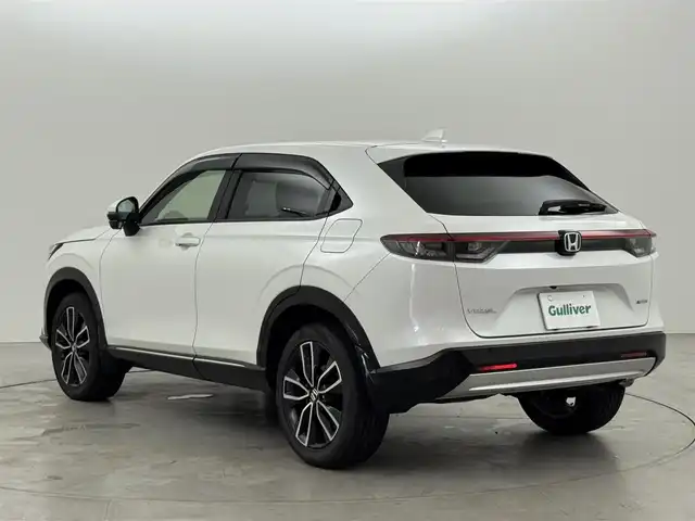 ホンダ ヴェゼル ハイブリッド e:HEV Z 福岡県 2022(令4)年 1.7万km プラチナホワイトパール 純正ナビ　/全方位カメラ　/置くだけ充電　/ビルトインETC２．０　/前後ドライブレコーダー　/アダプティブクルコン　/コーナーセンサー　/衝突被害軽減　/レーンキープ　/ＢＳＭ　/アクセル踏み間違い防止　/パワーバックドア　/シートヒーター　/ステアリングヒーター　/ＬＥＤヘッドライト