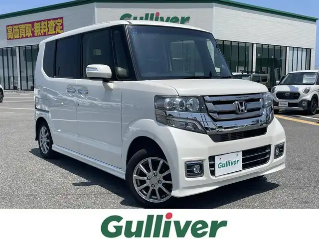 ホンダ Ｎ ＢＯＸ カスタム G SSパッケージ 鳥取県 2017(平29)年 7.8万km プレミアムホワイトパールⅡ 純正ナビ/フルセグ/DVD/CD/BT/バックカメラ/ビルトインETC/片側パワースライド/キセノンライト/プッシュエンジンスタート/前席シートヒーター/純正エアロパーツ/社外14インチアルミホイール/アイドリングストップ/オートライト/フォグライト/ウィンカーミラー/フロアマット/ドアバイザー