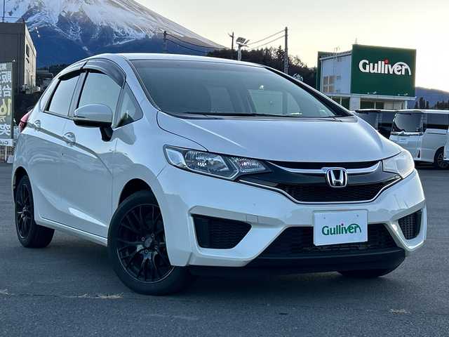 ホンダ フィット 13G Fパッケージ 山梨県 2017(平29)年 5.1万km プレミアムホワイトパールⅡ 純正SDナビ/　(CD/DVD/USB/SD/BT/フルセグTV)/バックカメラ/社外16インチアルミホイール/社外フロアマット/ハロゲンライト/フルオートエアコン/アイドリングストップ/横滑り防止装置/スマートキー/ETC