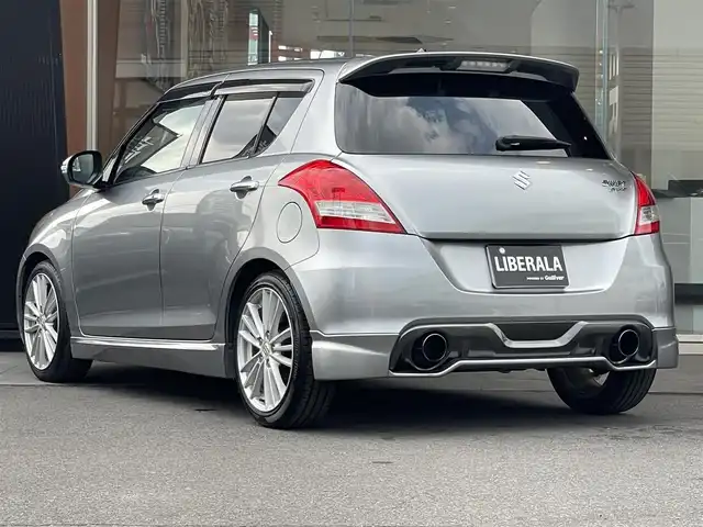 スズキ スイフト スポーツ 鹿児島県 2012(平24)年 8.4万km プレミアムシルバーメタリック 6速マニュアル車/社外ナビ(CN-MW240D)/社外CD/DVD再生可/社外フルセグTV/クルーズコントロール/オートエアコン/オートライト/社外マフラー/キセノンヘッドライト/電動格納ミラー/純正フォグ/ドアバイザー/保証書/取扱説明書/スペアキー1本(スマートキー)