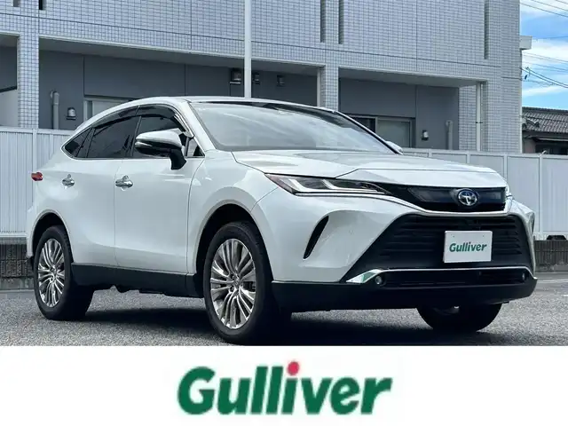 トヨタ ハリアー ハイブリッド Z 愛知県 2025(令7)年 0.3万km プラチナホワイトパールマイカ ワンオーナー/純正メモリナビ（FM/AM/BT/USB/Miracast/フルセグ)/Toyota Safety Sense/ ・プリクラッシュセーフティー/ ・レーントレーシングアシスト/ ・ブラインドスポットモニター/ ・クリアランスソナー/ ・リアクロストラフィックアラート/ ・パーキングサポートブレーキ/ ・ロードサインアシスト/ ・レーダークルーズコントロール/JBLサウンド/禁煙車/パノラミックビューカメラ/アラウンドビューモニター・バックカメラ/ETC2.0/ヘッドアップディスプレイ/パワーシート/ハーフレザーシート/nanoeX/デジタルインナーミラー/パワーバックドア/LEDヘッドライト/フォグランプ/革巻きステアリング/純正AW19インチ/電動格納ミラー/純正フロアマット/ドアバイザー/プッシュスタート/スマートキー・スペアキー１本/ステアリングリモコン/ハンズフリー/ABS/取扱説明書・保証書