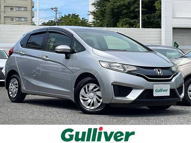 ホンダ フィット 13G Fパッケージ 東京都 2015(平27)年 2.4万km アラバスターシルバーメタリック ワンオーナー/新車時保証書/取扱説明書【車両/ナビ】/アイドリングストップ/純正メモリーナビ/ワンセグTV【VXM-145VSi】/SD/CD/DVD/BT/USB/バックカメラ/純正ドライブレコーダー/Egプッシュスタート/ ストップボタン/スマートキー/ヘッドライトレベライザー