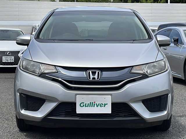 ホンダ フィット 13G Fパッケージ 東京都 2015(平27)年 2.4万km アラバスターシルバーメタリック ワンオーナー/新車時保証書/取扱説明書【車両/ナビ】/アイドリングストップ/純正メモリーナビ/ワンセグTV【VXM-145VSi】/SD/CD/DVD/BT/USB/バックカメラ/純正ドライブレコーダー/Egプッシュスタート/ ストップボタン/スマートキー/ヘッドライトレベライザー