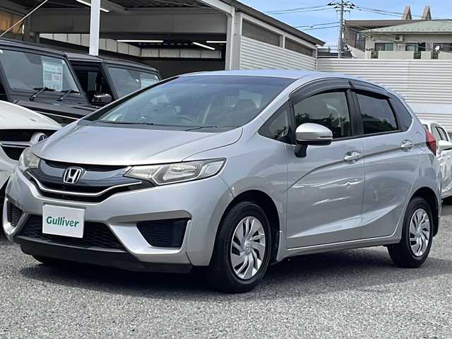 ホンダ フィット 13G Fパッケージ 東京都 2015(平27)年 2.4万km アラバスターシルバーメタリック ワンオーナー/新車時保証書/取扱説明書【車両/ナビ】/アイドリングストップ/純正メモリーナビ/ワンセグTV【VXM-145VSi】/SD/CD/DVD/BT/USB/バックカメラ/純正ドライブレコーダー/Egプッシュスタート/ ストップボタン/スマートキー/ヘッドライトレベライザー